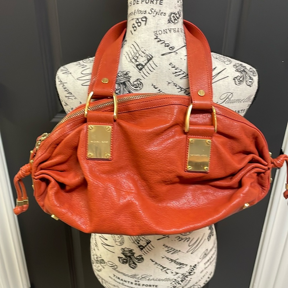 Michael Kors Orange leather bag made in Italy
094